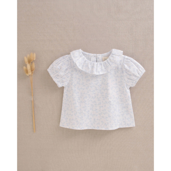 Blusa de bebé niña con detalles azules